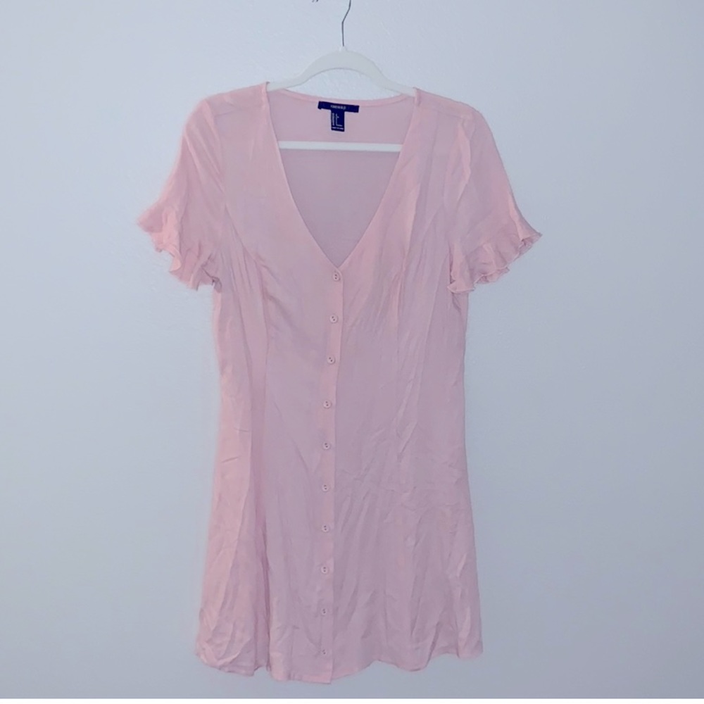 Light pink flowy button down dress